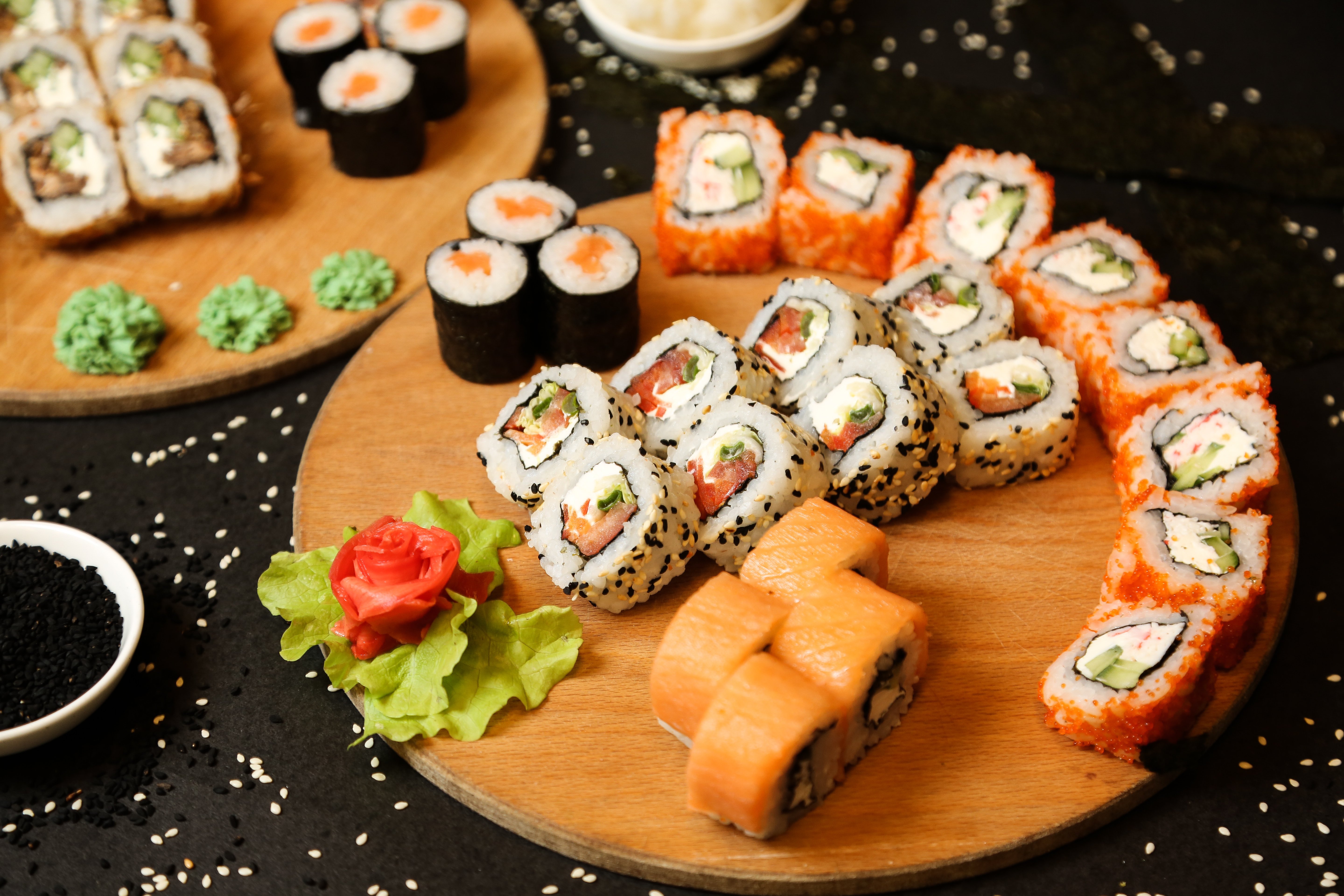 side-view-mix-sushi-rolls-tray-with-ginger-wasabi